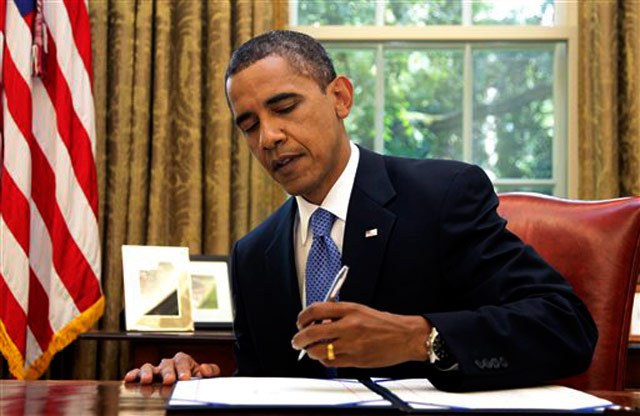 obama signs refugee bill